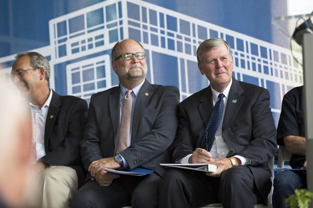 GVL / Kevin Sielaff
President Thomas Haas sits with Senate Majority Leader Arlan Meekhof. Grand Valley celebrates the P. Douglas Kindschi Hall of Science with a dedication ceremony Friday, August 28th, 2015. The dedication recognized both Grand Valley and state officials that made the realization of this building possible. 