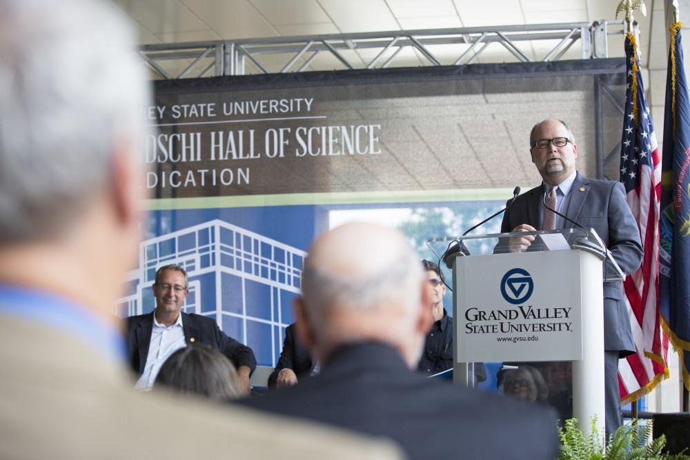 GVL / Kevin Sielaff
Senate majority leader Arlan Meekhof speaks during the festivities. Grand Valley celebrates the P. Douglas Kindschi Hall of Science with a dedication ceremony Friday, August 28th, 2015. The dedication recognized both Grand Valley and state officials that made the realization of this building possible. 