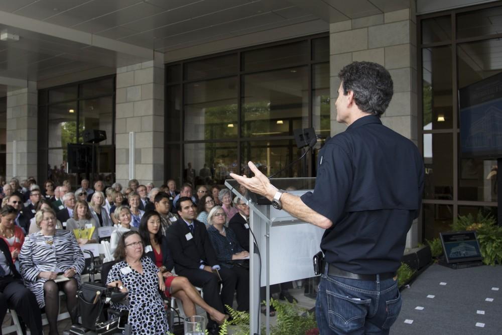 GVL / Kevin Sielaff
Dean Kamen, founder and president of DEKA Research and Development Corp., speaks before the new science hall. Grand Valley celebrates the P. Douglas Kindschi Hall of Science with a dedication ceremony Friday, August 28th, 2015. The dedication recognized both Grand Valley and state officials that made the realization of this building possible. 