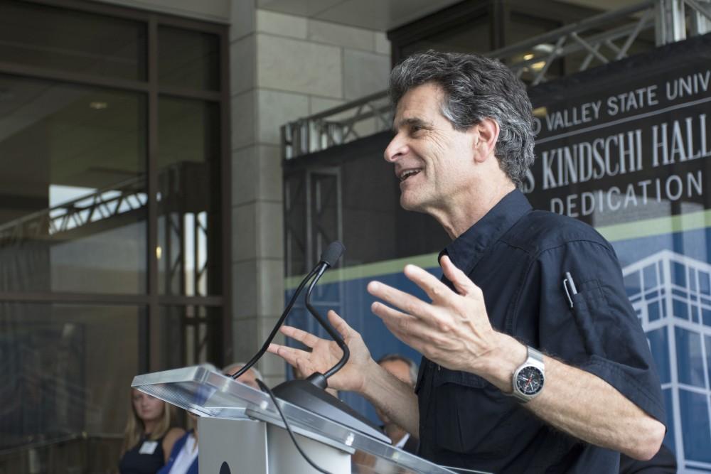 GVL / Kevin Sielaff
Dean Kamen, founder and president of DEKA Research and Development Corp., speaks before the new science hall. Grand Valley celebrates the P. Douglas Kindschi Hall of Science with a dedication ceremony Friday, August 28th, 2015. The dedication recognized both Grand Valley and state officials that made the realization of this building possible. 