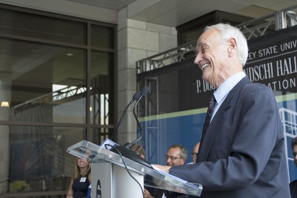 GVL / Kevin Sielaff
Former dean of math and sciences, P. Douglas Kindschi, speaks before the Kindschi Hall of Science. Grand Valley celebrates the P. Douglas Kindschi Hall of Science with a dedication ceremony Friday, August 28th, 2015. The dedication recognized both Grand Valley and state officials that made the realization of this building possible. 