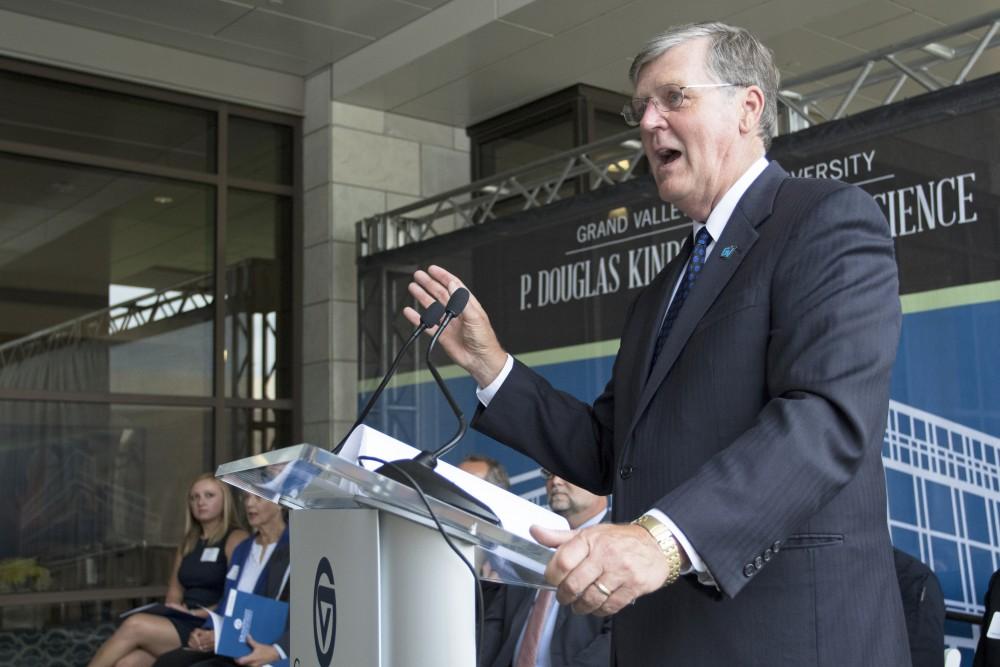 GVL / Kevin Sielaff
President Thomas Haas speaks to the crowds gathered at the dedication of the Kindschi Hall of Science. Grand Valley celebrates the P. Douglas Kindschi Hall of Science with a dedication ceremony Friday, August 28th, 2015. The dedication recognized both Grand Valley and state officials that made the realization of this building possible. 