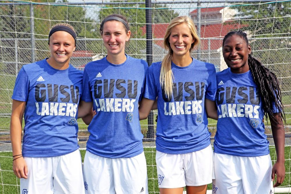 GVL / Emily FryeGrand Valleys senior womens soccer players from left to right, Maddison Reynolds, Katy Woolley, Katie Klunder, and Katie Bounds. The womens soccer team will begin their regular season on September 4th against Quincy University.