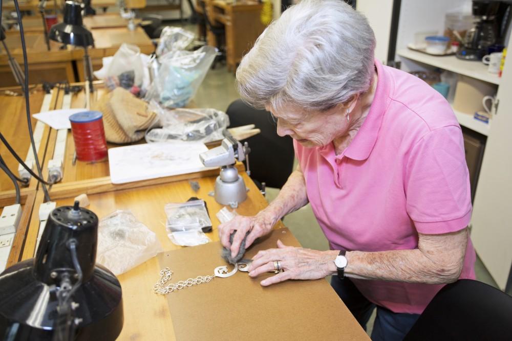 GVL / Kevin Sielaff
86-year-old metalsmithing student, Ann Dilley, works in the Calder Art Center Tuesday, September 1st, 2015. Dilley, inspired by her mother, has been a student at Grand Valley for the past 35 years. 