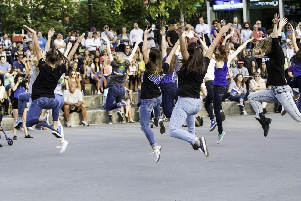 GVL / Sara Carte
Grand Valley’s Dance Team dances to the marching band on the opening night of Grand Rapids seventh annual Art Prize in the Rosa Parks Circle on Sept. 23.