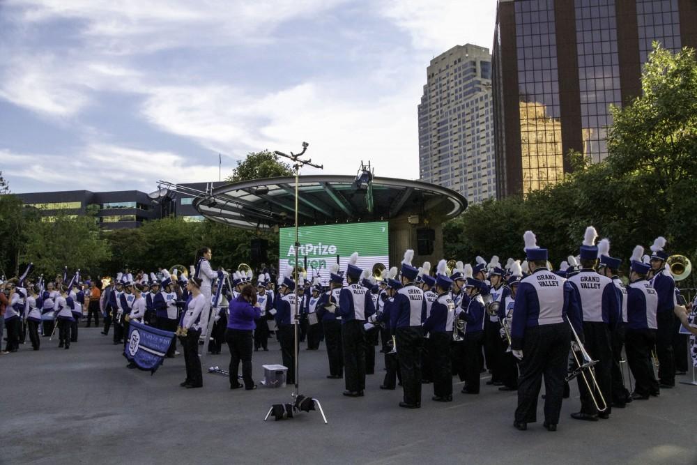 GVL / Sara Carte
Grand Valley’s Marching Band gets ready to perform for opening night of Grand Rapids seventh annual Art Prize in the Rosa Parks Circle on Sept. 23.