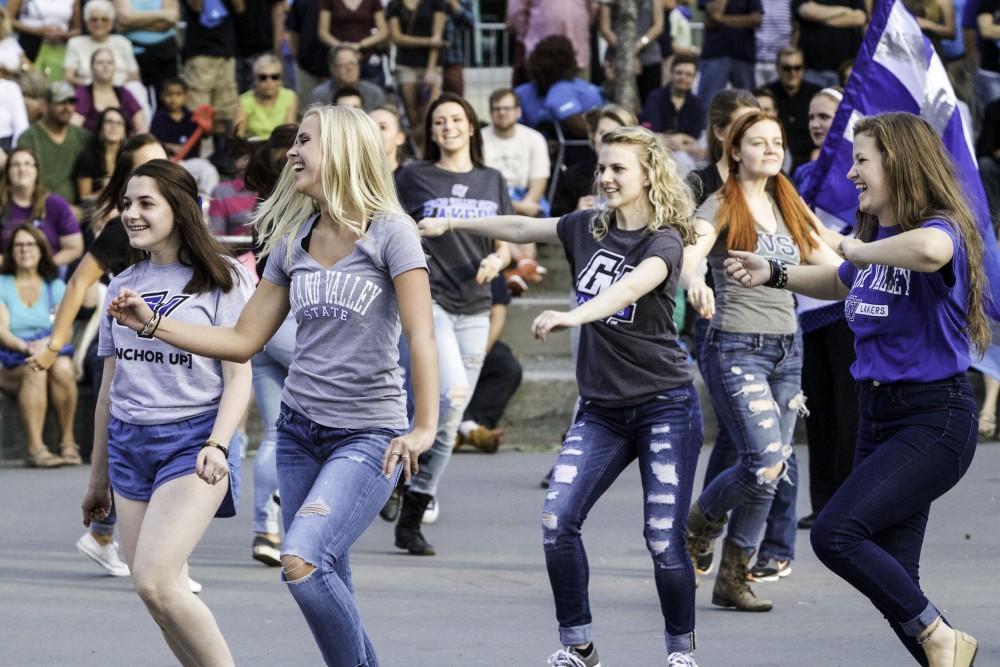 GVL / Sara Carte
Grand Valley’s Dance Team dances to the marching band on the opening night of Grand Rapids seventh annual Art Prize in the Rosa Parks Circle on Sept. 23.