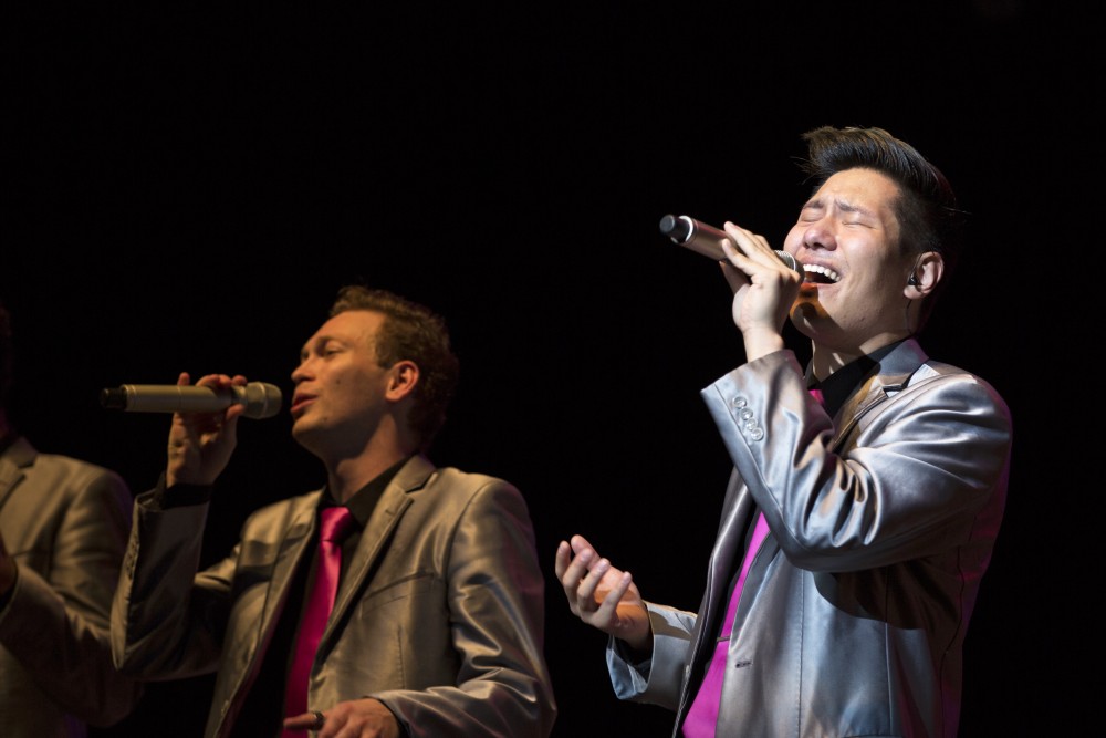 GVL / Kevin Sielaff
Peter Yang of the Cat's Pajamas sings to the crowd. The Cat's Pajamas, a nationally known vocal band, headlines a concert including Grand Valley's all-women a cappella group Midnight Snack and local high school group vocalists. 