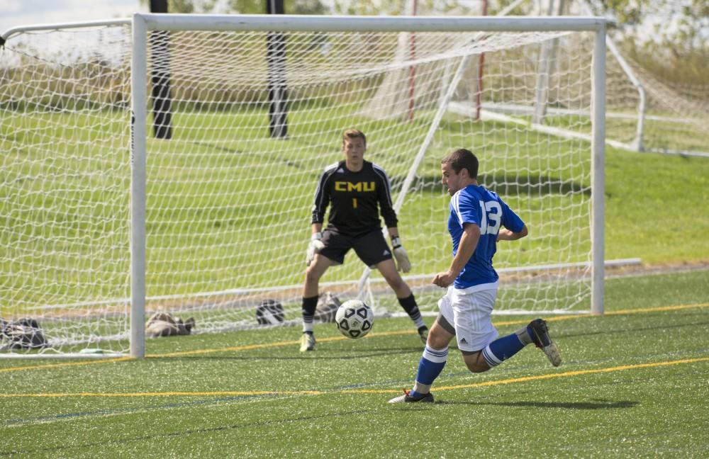 GVL/Kevin Sielaff
Robert Klein lines up for a shot on goal. Grand Valley's club soccer team squares off against Central Michigan Sept. 12 at the intramural field. 