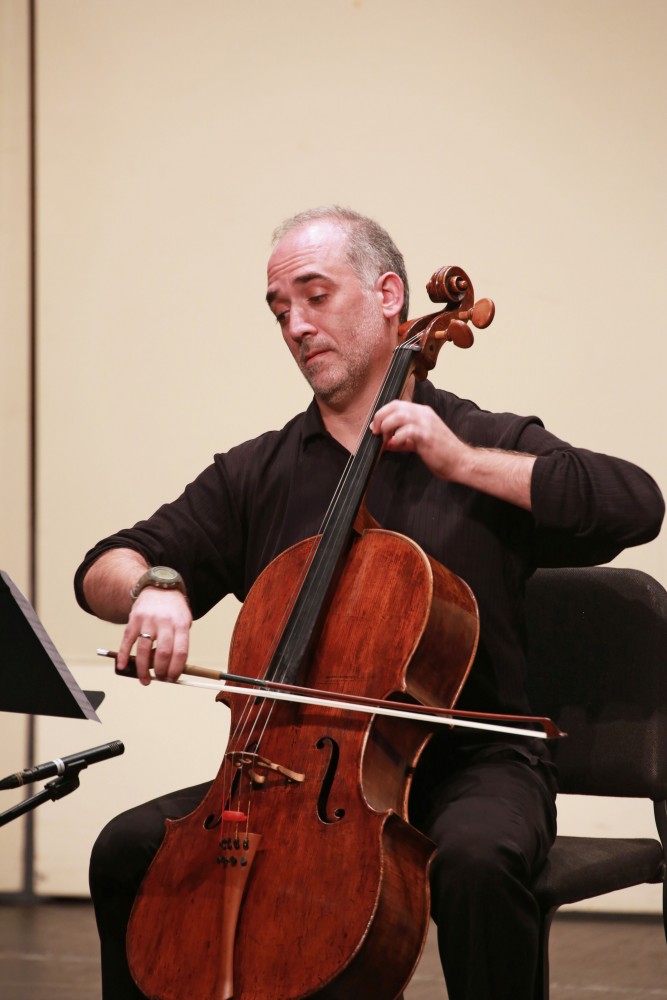 GVL / Kevin Sielaff
Associate professor Pablo Mahave-Veglia perfoms "Simple Lines" on the Cello. The GVSU music department presents a faculty concert as a part of Fall Art Celebration Sept. 21 in the Louis Armstrong Theatre. 