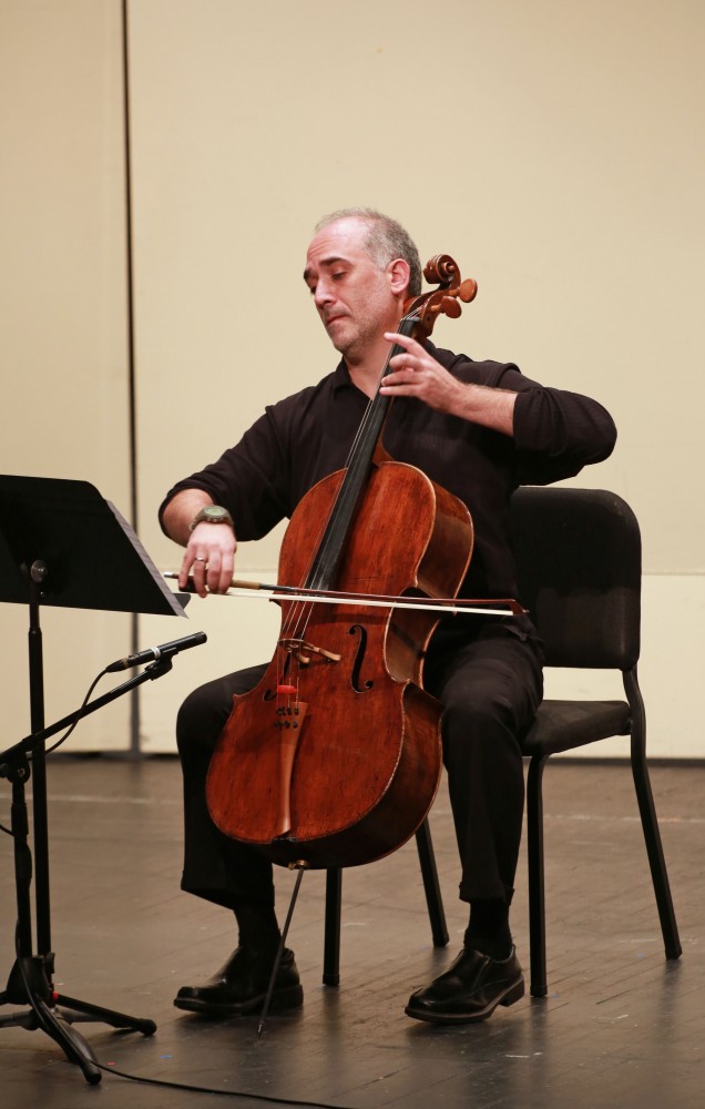 GVL / Kevin Sielaff
Associate professor Pablo Mahave-Veglia perfoms "Simple Lines" on the Cello. The GVSU music department presents a faculty concert as a part of Fall Art Celebration Sept. 21 in the Louis Armstrong Theatre.