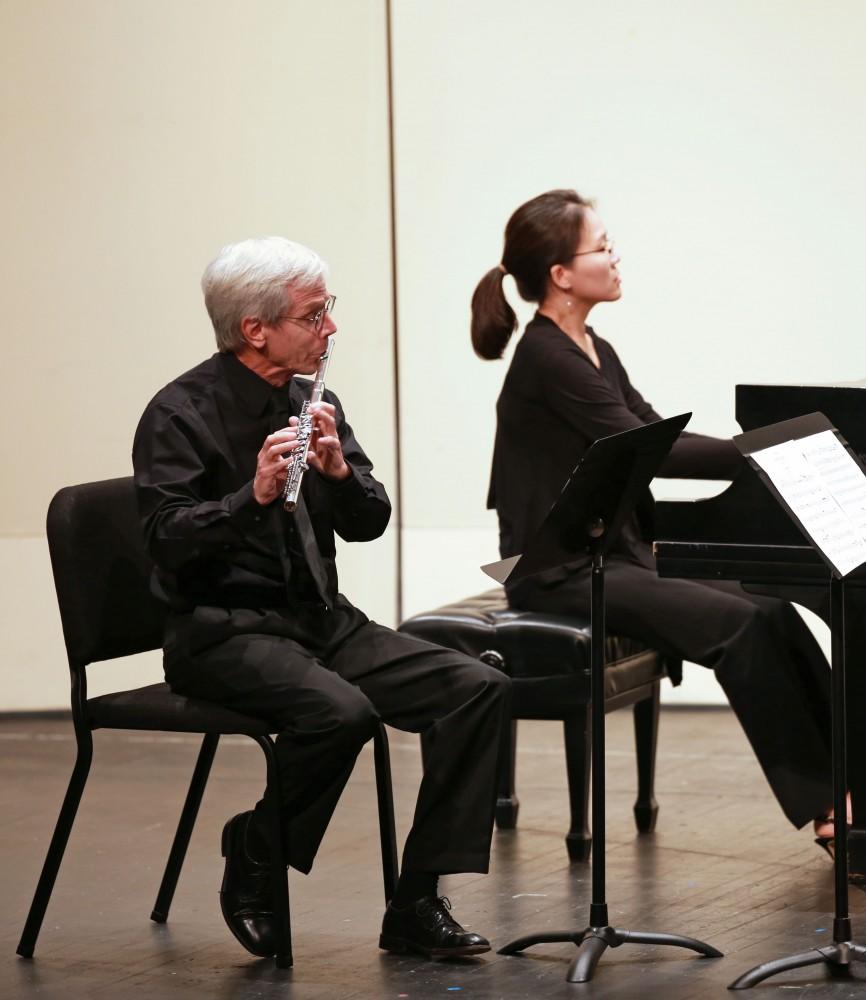 GVL / Kevin Sielaff
Grand Rapids Symphony performs Christopher Kantner (flute), Richard Britsch (horn), and Sookkyung Cho (piano), perform "Souvenir du Rigi."  The GVSU music department presents a faculty concert as a part of Fall Art Celebration Sept. 21 in the Louis Armstrong Theatre.