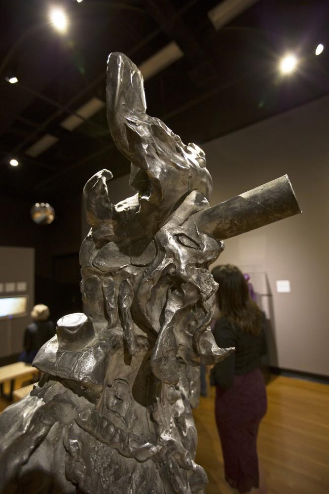 GVL/Kevin Sielaff
Jonathan Meese's "Chips-Teufel," 2007, aims to provoke a certain intensity within a man-based steel statue. The annual Fall Arts Celebration unveils the "Dusk to Dusk: Unsettled, Unraveled, Unreal" exhibit Sept. 10 inside the Performing Arts Center on Grand Valley's Allendale campus.