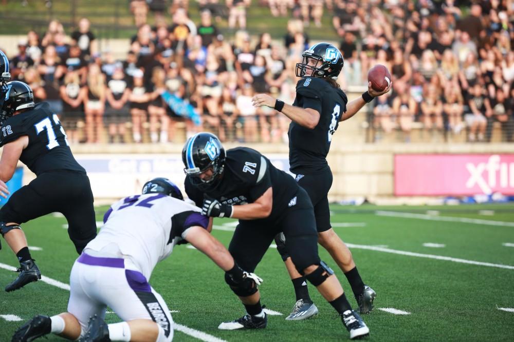 GVL / Kevin Sielaff
Grand Valley State squares off against Southwest Baptist Thursday, September 3rd, 2015 at Lubbers Stadium. Bart Williams (6) looks to throw downfield. 