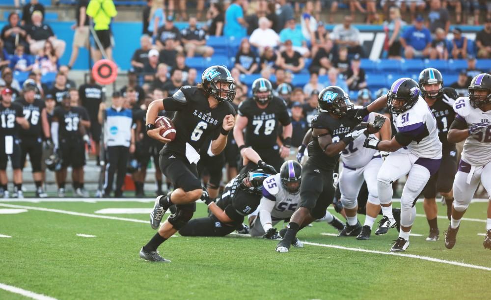 GVL / Kevin Sielaff
Grand Valley State squares off against Southwest Baptist Thursday, September 3rd, 2015 at Lubbers Stadium. Bart Williams (6) runs the ball downfield. 