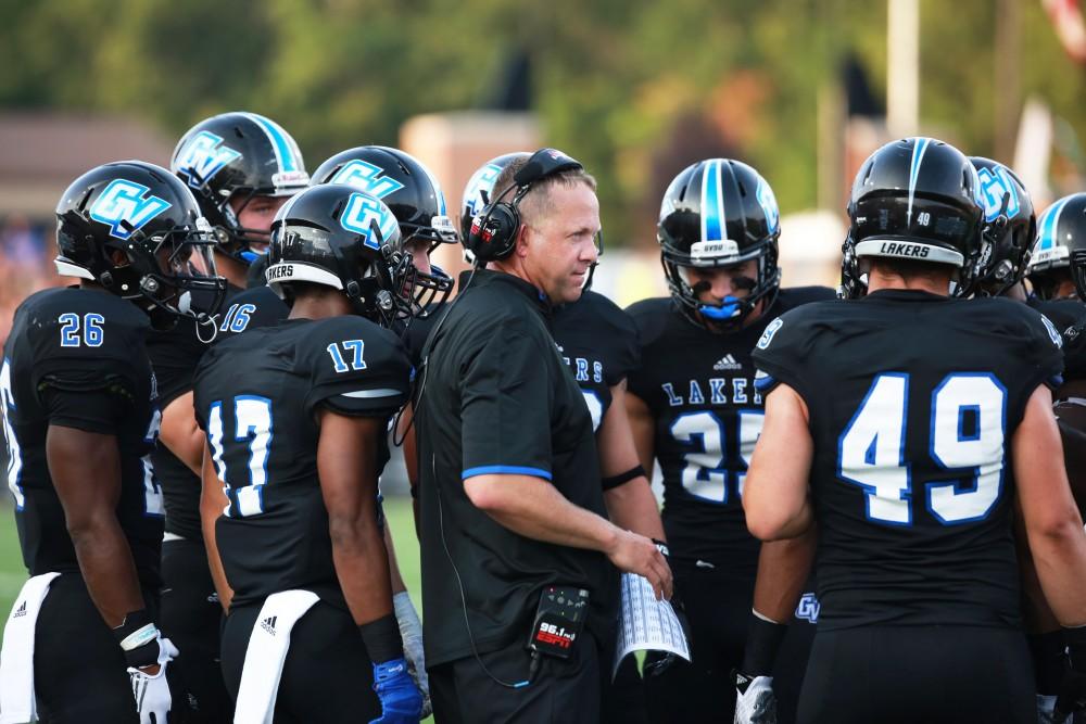 GVL / Kevin SielaffGrand Valley State squares off against Southwest Baptist Thursday, September 3rd, 2015 at Lubbers Stadium. Head coach Matt Mitchell instructs the team during a time-out.