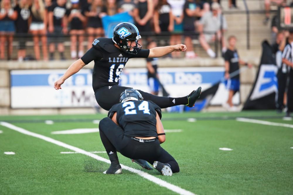 GVL / Kevin Sielaff 
Joel Schipper (19) fires a kick toward the field goal posts. Grand Valley State squares off against Southwest Baptist Thursday, September 3rd, 2015 at Lubbers Stadium. 