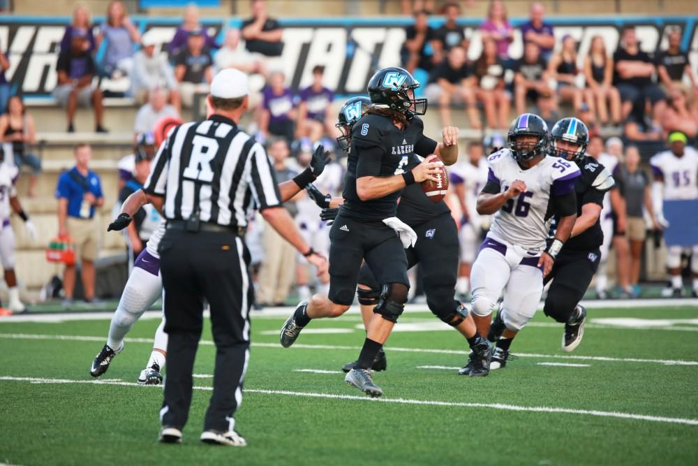 GVL / Kevin Sielaff 
Bart Williams (6) attempts to run the ball. Grand Valley State squares off against Southwest Baptist Thursday, September 3rd, 2015 at Lubbers Stadium. 