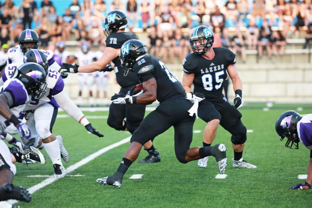 GVL / Kevin Sielaff 
Jalen Bryant (26) runs the ball. Grand Valley State squares off against Southwest Baptist Thursday, September 3rd, 2015 at Lubbers Stadium. 