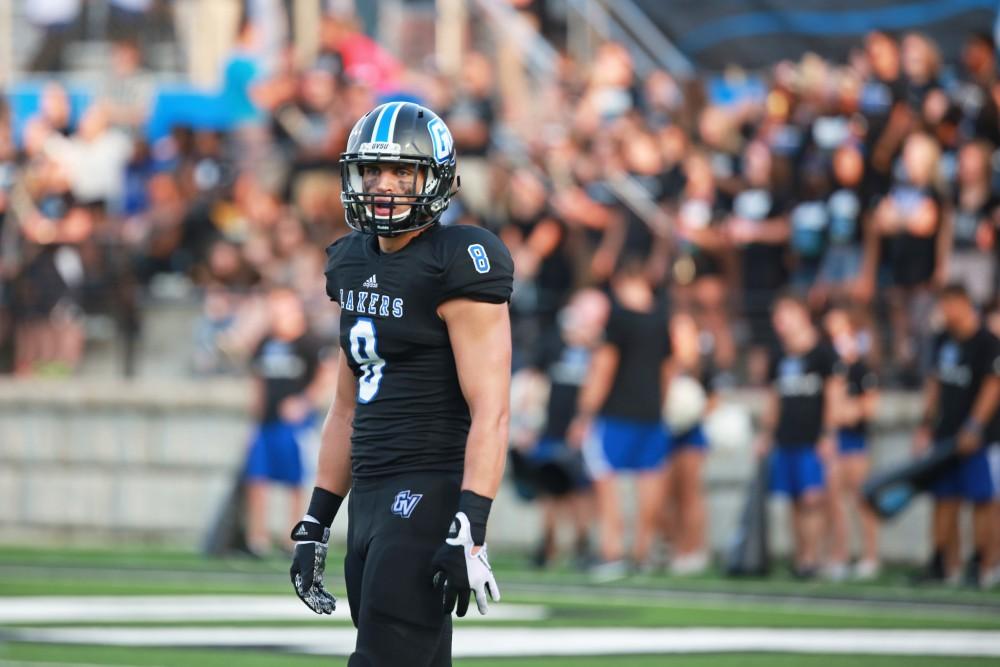 GVL / Kevin Sielaff 
Joe Robbins (8) looks toward the scrimmage line. Grand Valley State squares off against Southwest Baptist Thursday, September 3rd, 2015 at Lubbers Stadium. 