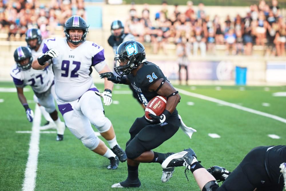 GVL / Kevin Sielaff 
Martayveous Carter (34) spins to change direction. Grand Valley State squares off against Southwest Baptist Thursday, September 3rd, 2015 at Lubbers Stadium. 