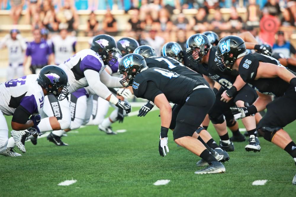 GVL / Kevin Sielaff 
Nick Keizer (41) sets himself at the line of scrimmage. Grand Valley State squares off against Southwest Baptist Thursday, September 3rd, 2015 at Lubbers Stadium. 