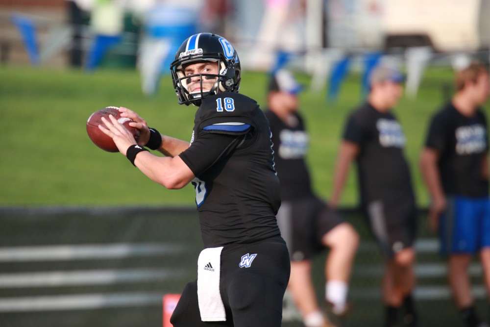 GVL / Kevin Sielaff 
Ollie Ajami (18) warms up before the game. Grand Valley State squares off against Southwest Baptist Thursday, September 3rd, 2015 at Lubbers Stadium. 