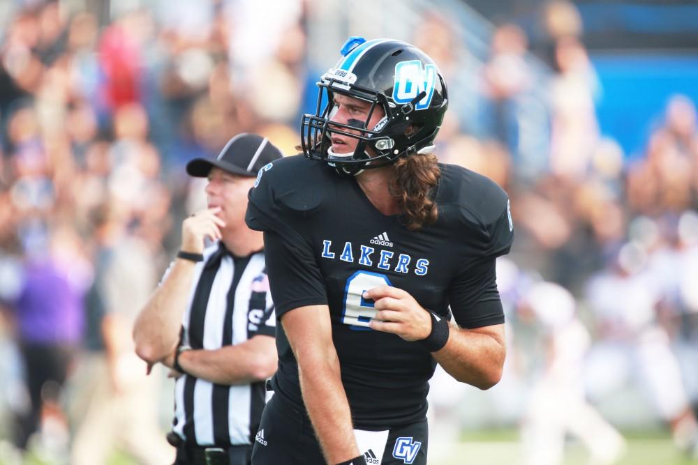 GVL / Kevin Sielaff 
Bart Williams (6) warms up before the game. Grand Valley State squares off against Southwest Baptist Thursday, September 3rd, 2015 at Lubbers Stadium. 