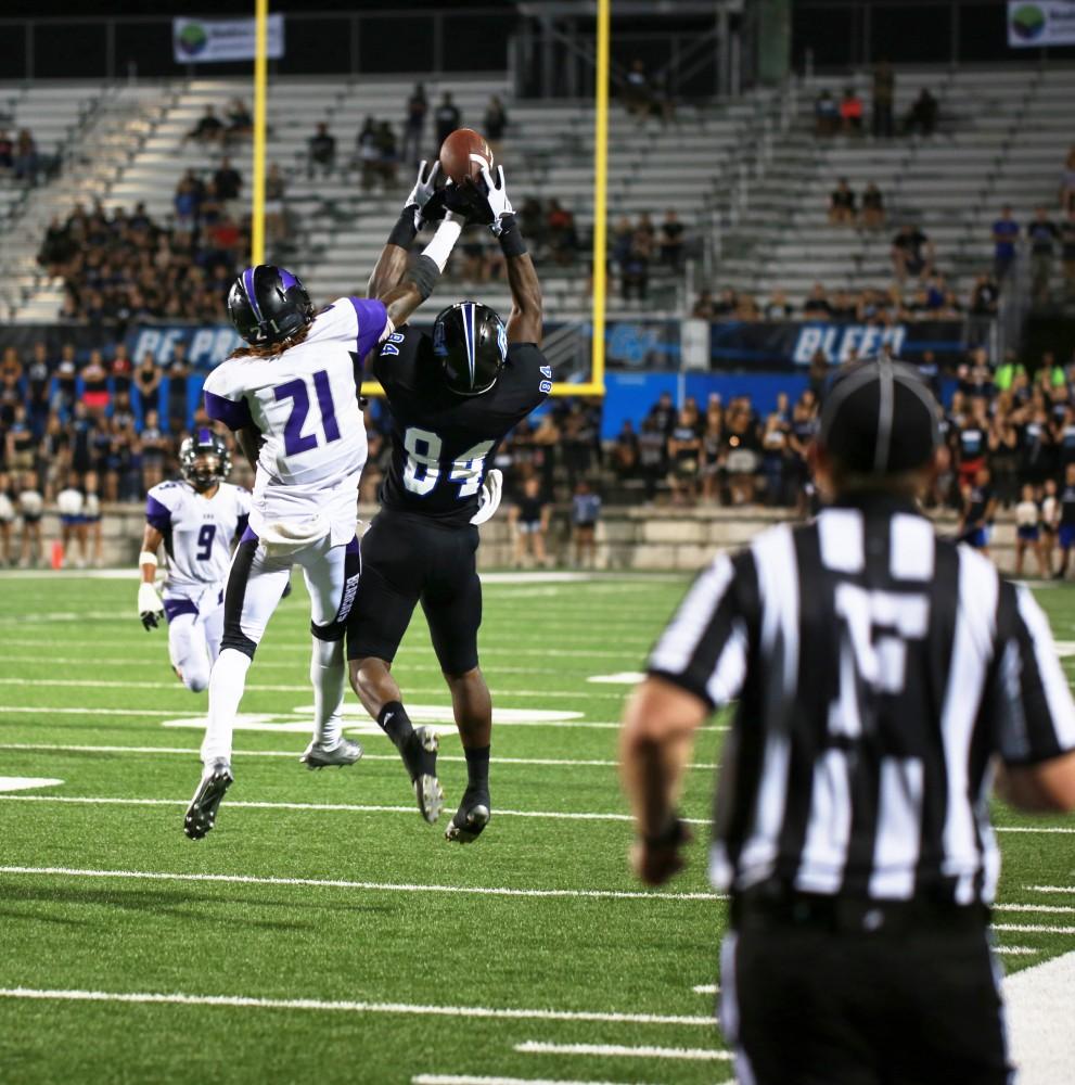 GVL / Kevin Sielaff 
Urston Smith (84) reaches up to grab a pass. Grand Valley State squares off against Southwest Baptist Thursday, September 3rd, 2015 at Lubbers Stadium. 