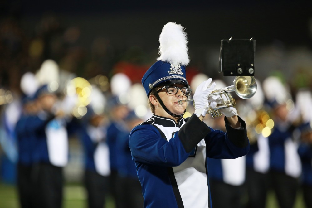 GVL / Kevin Sielaff 
The Laker Marching Band takes the field during halftime. Grand Valley State squares off against Southwest Baptist Thursday, September 3rd, 2015 at Lubbers Stadium. 