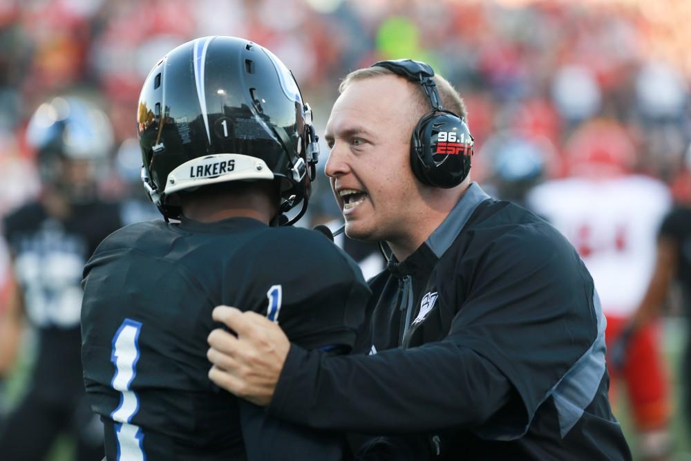 GVL / Kevin Sielaff     Co-defensive coordinator Nick Postma confronts Devin McKissic (1) for foul play. Grand Valley State University squares off against Ferris State University Sept. 19 at Lubbers Stadium in Allendale. The Lakers were defeated, with a final score of 61-24.