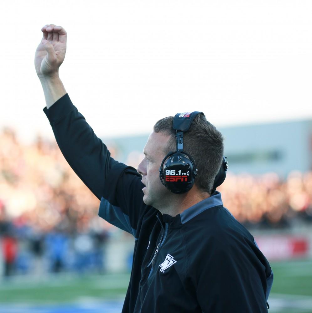 GVL / Kevin Sielaff     Head coach Matt Mitchell calls for a certain play. Grand Valley State University squares off against Ferris State University Sept. 19 at Lubbers Stadium in Allendale. The Lakers were defeated, with a final score of 61-24.