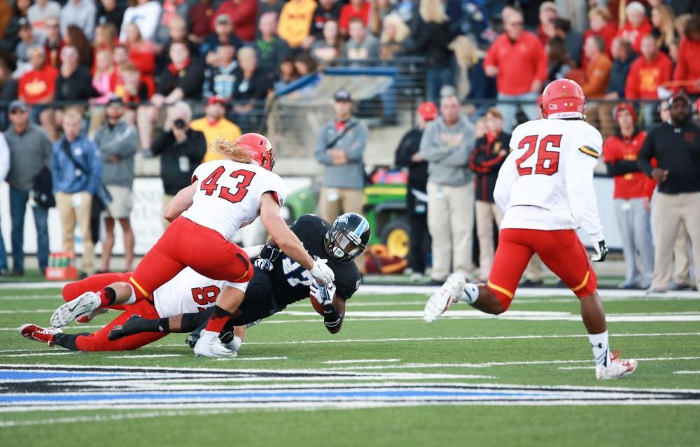 GVL / Kevin Sielaff     Kirk Spencer (27) is taken to the ground by Ferris' defense. Grand Valley State University squares off against Ferris State University Sept. 19 at Lubbers Stadium in Allendale. The Lakers were defeated, with a final score of 61-24.