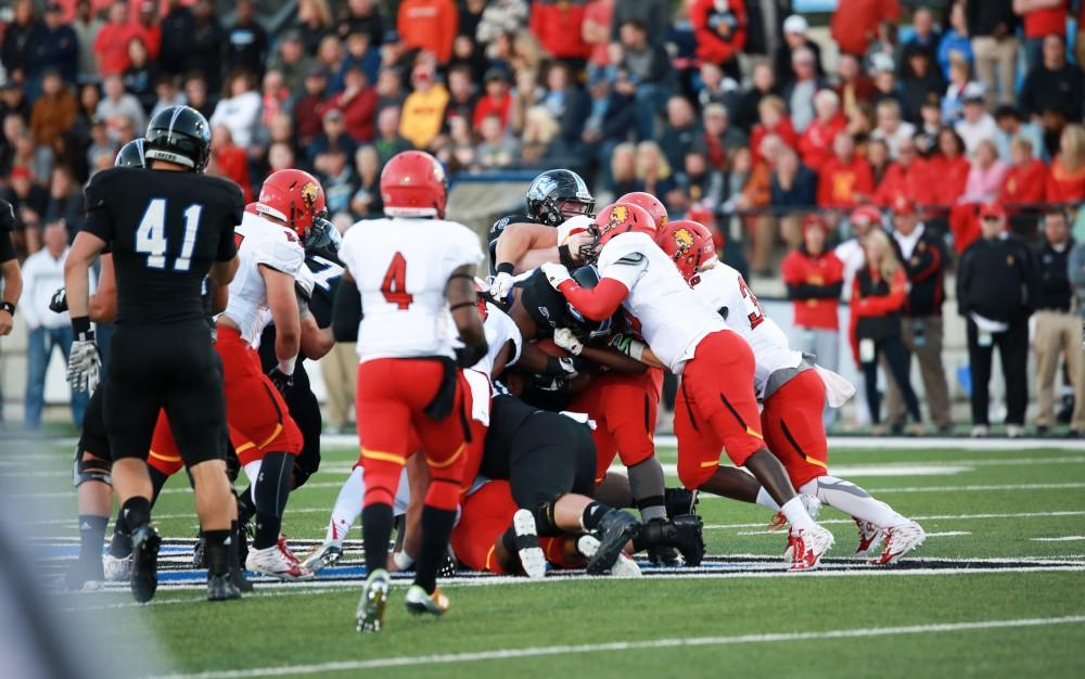 GVL / Kevin Sielaff     Running back Terrell Dorsey (22) is tackled. Grand Valley State University squares off against Ferris State University Sept. 19 at Lubbers Stadium in Allendale. The Lakers were defeated, with a final score of 61-24.