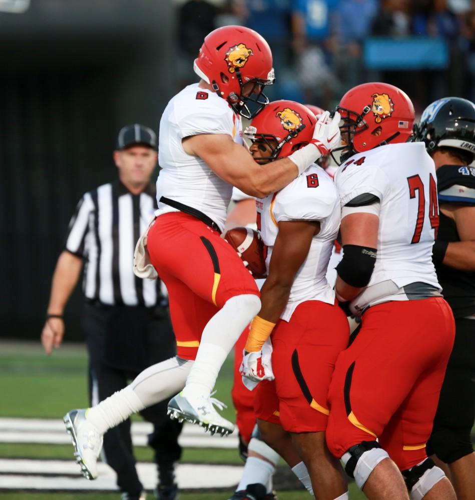 GVL / Kevin Sielaff     Shakur Sanders (6) of Ferris celebrates a touchdown. Grand Valley State University squares off against Ferris State University Sept. 19 at Lubbers Stadium in Allendale. The Lakers were defeated, with a final score of 61-24.