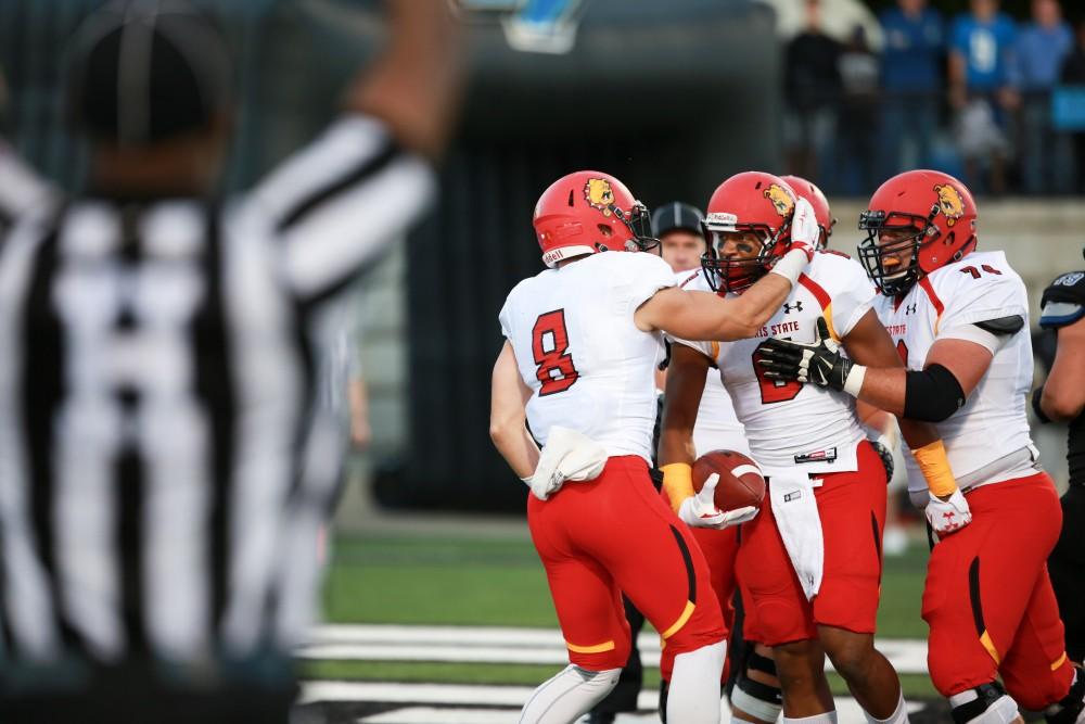 GVL / Kevin Sielaff    Shakur Sanders (6) of Ferris celebrates a touchdown.  Grand Valley State University squares off against Ferris State University Sept. 19 at Lubbers Stadium in Allendale. The Lakers were defeated, with a final score of 61-24.