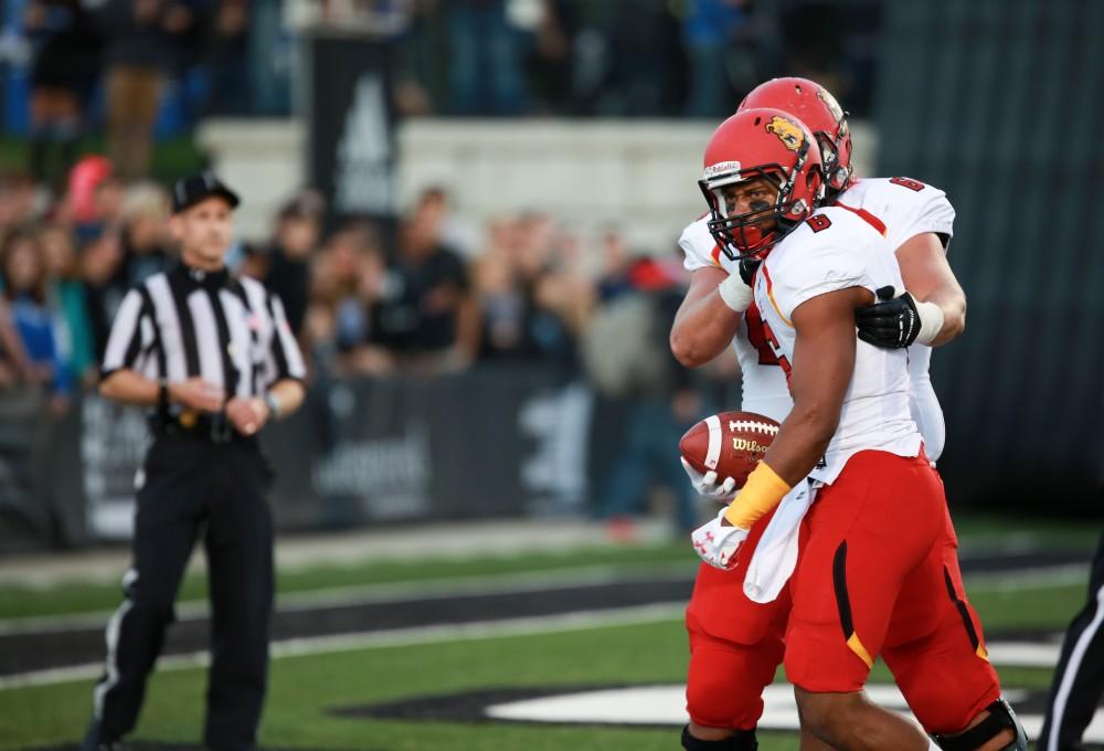 GVL / Kevin Sielaff     Shakur Sanders (6) of Ferris celebrates a touchdown. Grand Valley State University squares off against Ferris State University Sept. 19 at Lubbers Stadium in Allendale. The Lakers were defeated, with a final score of 61-24.