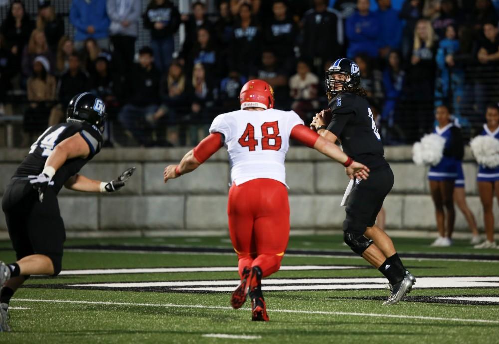 GVL / Kevin Sielaff     Bart Williams (6) looks for a receiver. Grand Valley State University squares off against Ferris State University Sept. 19 at Lubbers Stadium in Allendale. The Lakers were defeated, with a final score of 61-24.