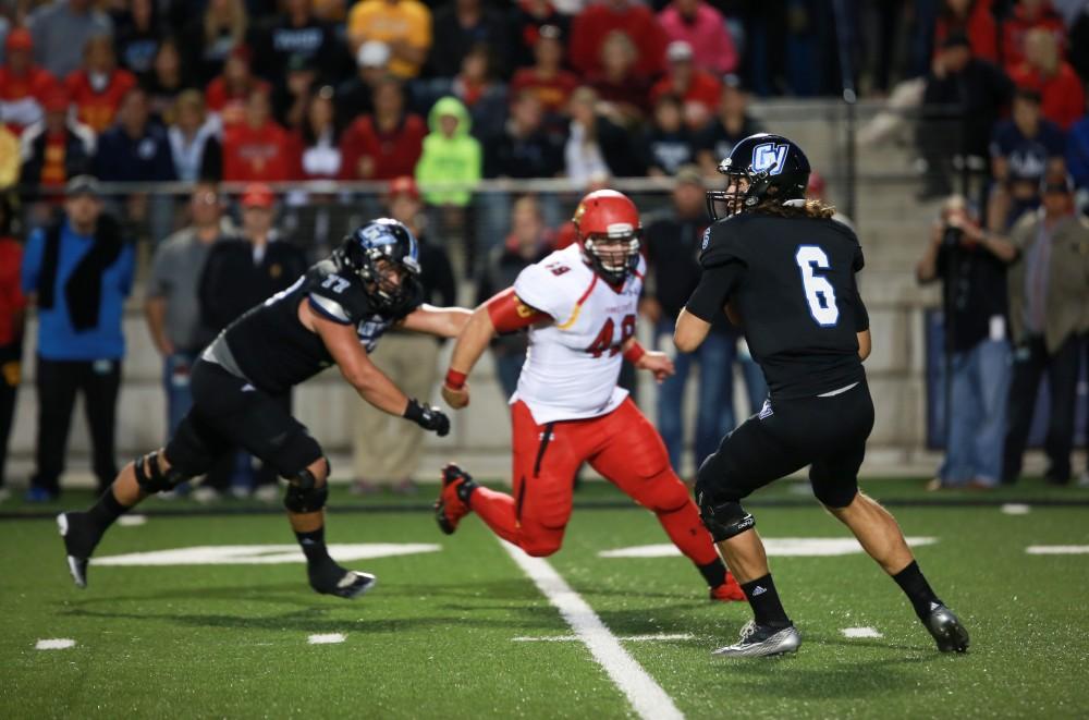 GVL / Kevin Sielaff     Bart Williams (6) looks for a receiver. Grand Valley State University squares off against Ferris State University Sept. 19 at Lubbers Stadium in Allendale. The Lakers were defeated, with a final score of 61-24.