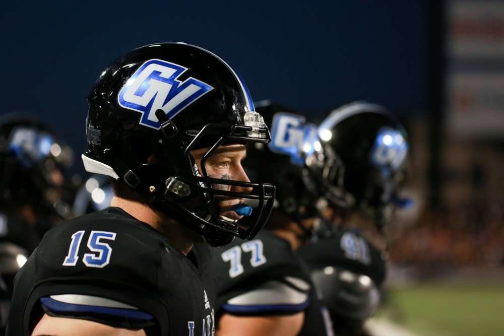 GVL / Kevin Sielaff     Jamie Potts (15) examines the play. Grand Valley State University squares off against Ferris State University Sept. 19 at Lubbers Stadium in Allendale. The Lakers were defeated, with a final score of 61-24.