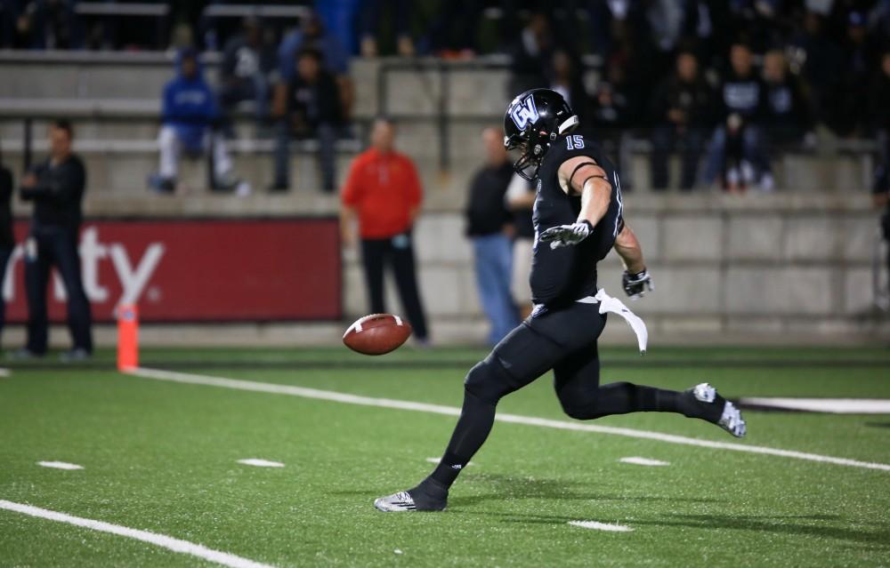 GVL / Kevin Sielaff     Jamie Potts (15) punts the ball. Grand Valley State University squares off against Ferris State University Sept. 19 at Lubbers Stadium in Allendale. The Lakers were defeated, with a final score of 61-24.