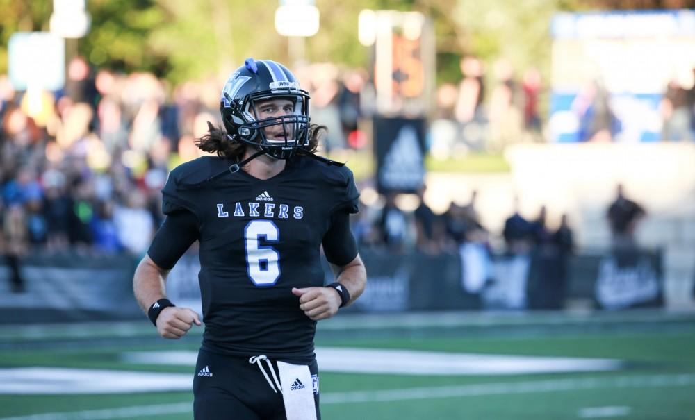 GVL / Kevin Sielaff     Quarterback Bart Williams (6) runs back to the Grand Valley bench. Grand Valley State University squares off against Ferris State University Sept. 19 at Lubbers Stadium in Allendale. The Lakers were defeated, with a final score of 61-24.