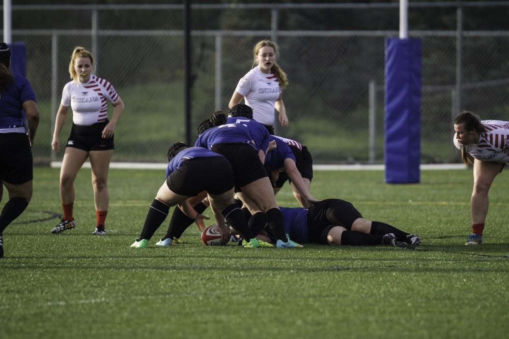 GVL / Sara Carte
Grand Valley’s Women’s Club Rugby team goes against Indiana University on Friday night, September 4, 2015.