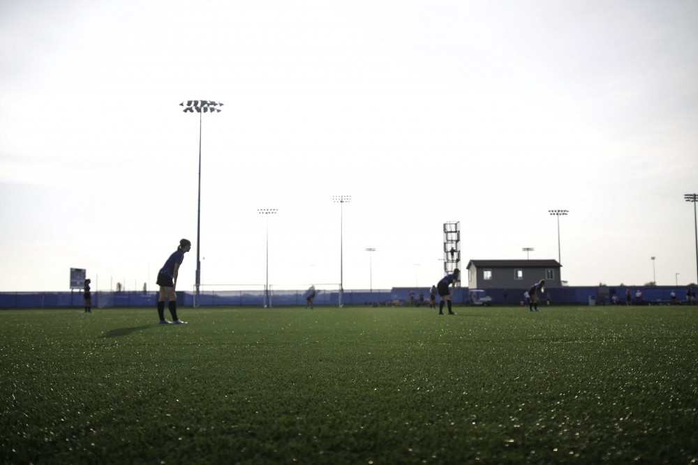 GVL / Sara Carte
Grand Valley’s Women’s Club Rugby team goes against Indiana University on Friday night, September 4, 2015.