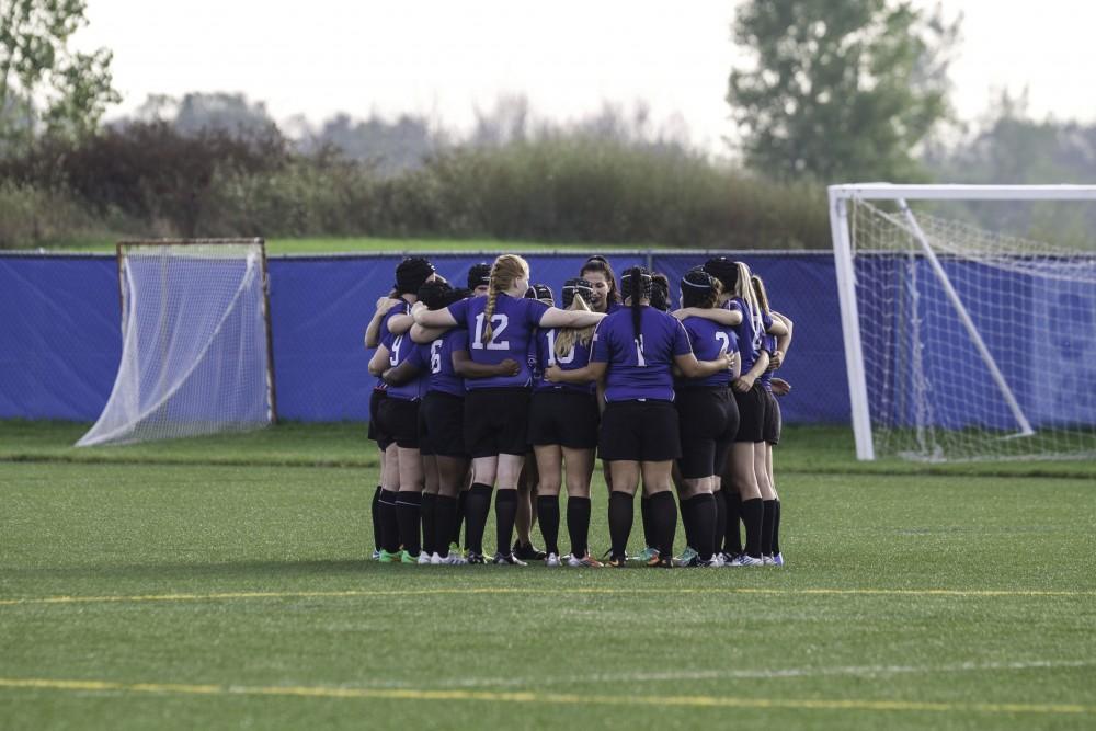 GVL / Sara Carte
Grand Valley’s Women’s Rugby team gets ready to take on Indiana University on Friday night, September 4th, 2015.