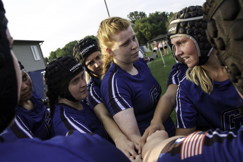 GVL / Sara Carte
Grand Valley’s Women’s Club Rugby captain, Maria Midena, talks to her teammates during half time against Indiana university on Friday night, Septemeber 4, 2015.