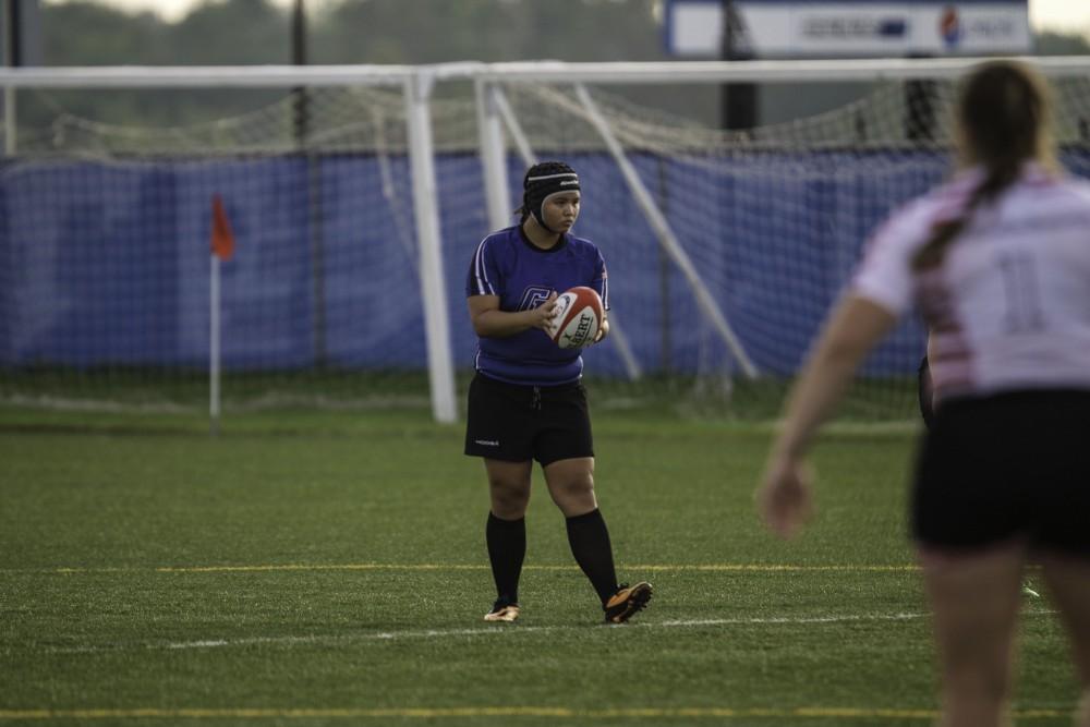 GVL / Sara Carte
Grand Valley’s Women’s Rugby player, Leah Fast, gets ready to kick the ball against Indiana University on Friday night, September 4, 2015.