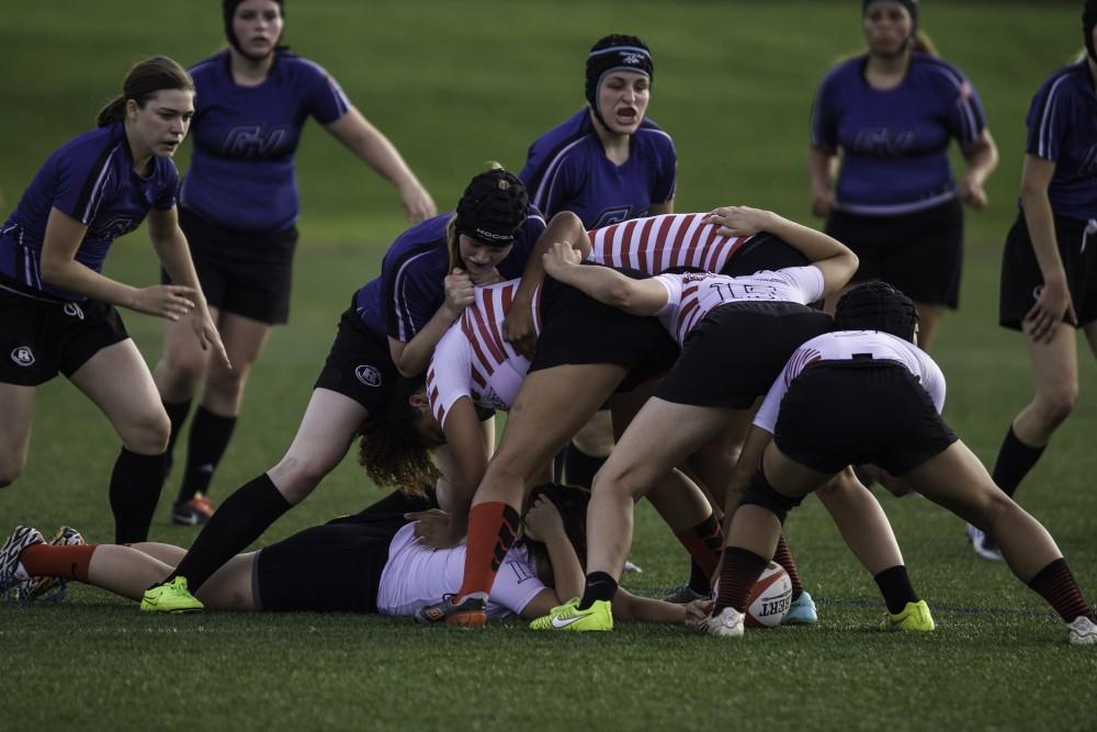 GVL / Sara Carte
Grand Valley’s Women’s Club Rugby team goes against Indiana University on Friday night, September 4, 2015.