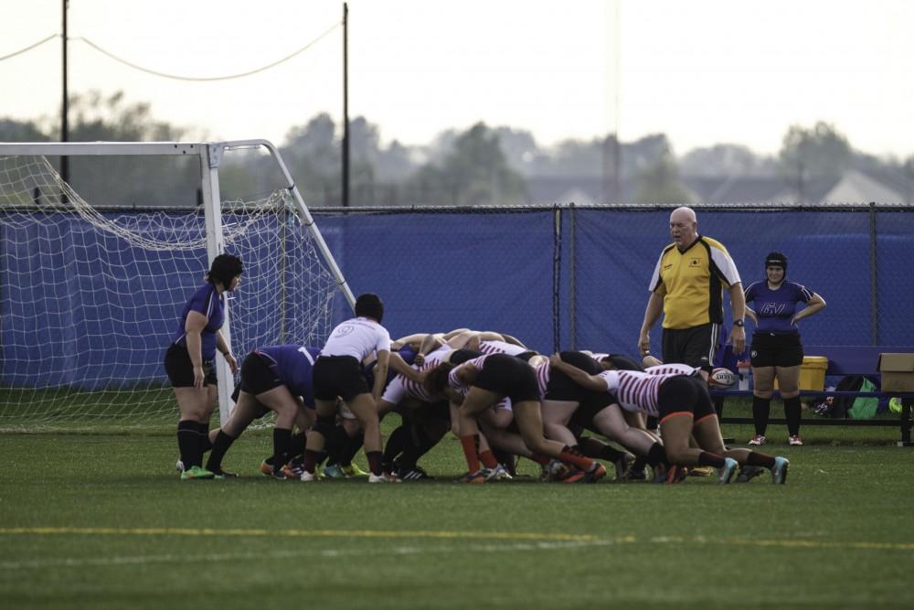 GVL / Sara Carte
Grand Valley’s Women’s Club Rugby team goes against Indiana University on Friday night, September 4, 2015.