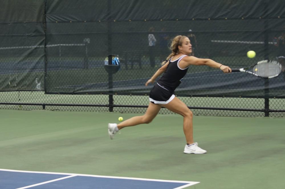 GVL/Lauren Loria
GVSU Tennis Player Abby Perkins plays against Wayne State University Saturday.                               
